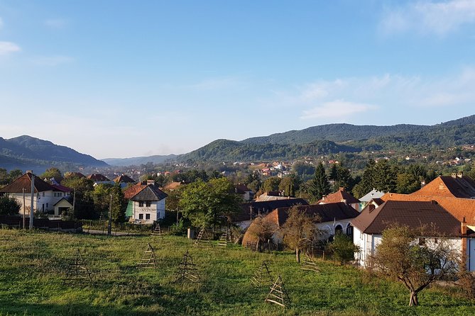 11-Day Romania Tour from Bucharest with Transylvania & Bucovina - Sinaia and Peles Castle, then Brasov: medieval edges under the Carpathians