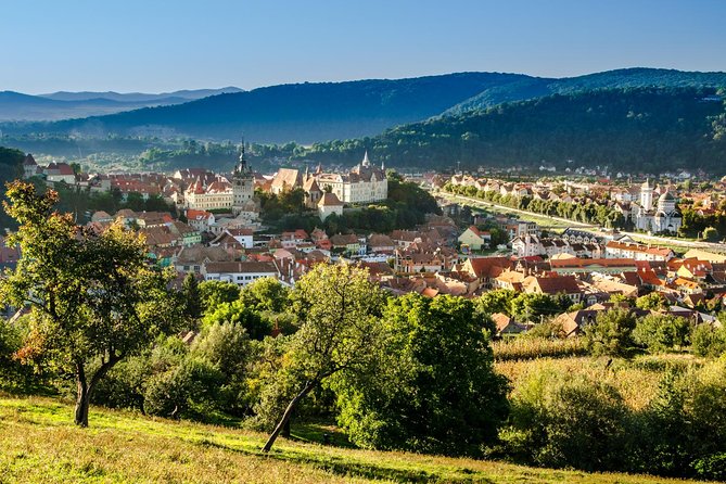2-Day Medieval Transylvania with Brasov,Sibiu and Sighisoara Tour from Bucharest - Getting Started in Bucharest: A 7:30am Van Trip With Real Commentary