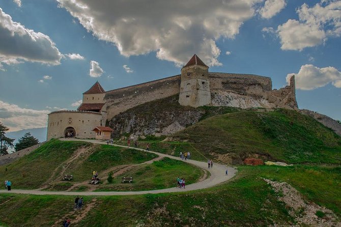 3-Castle: Peles,Bran,Rasnov,Sinaia Monastery from Brasov w pickup - Bran Castle: Dracula legend, steep steps, and a guide primer outside