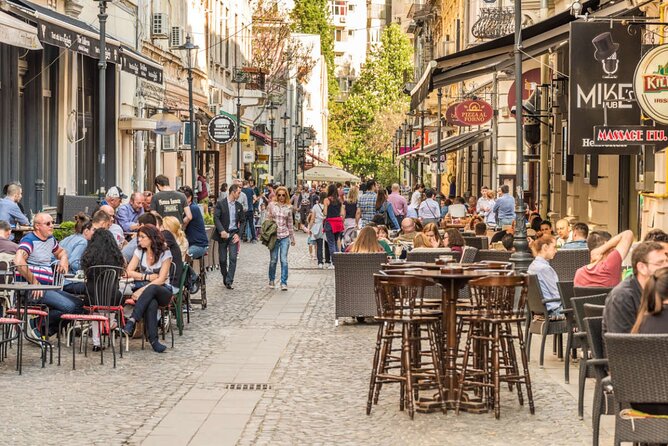 Best Walking Tour of Bucharest's City Center - 2.5 hours - Carol I’s city markers: Biblioteca Centrala and University Square