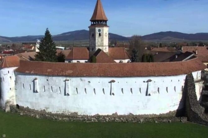 Bran Castle, Rasnov Fortress, Harman & Prejmer Fortified Churches Day Tour - Fortified Church of Harman: Romanesque roots and the 56m bell tower