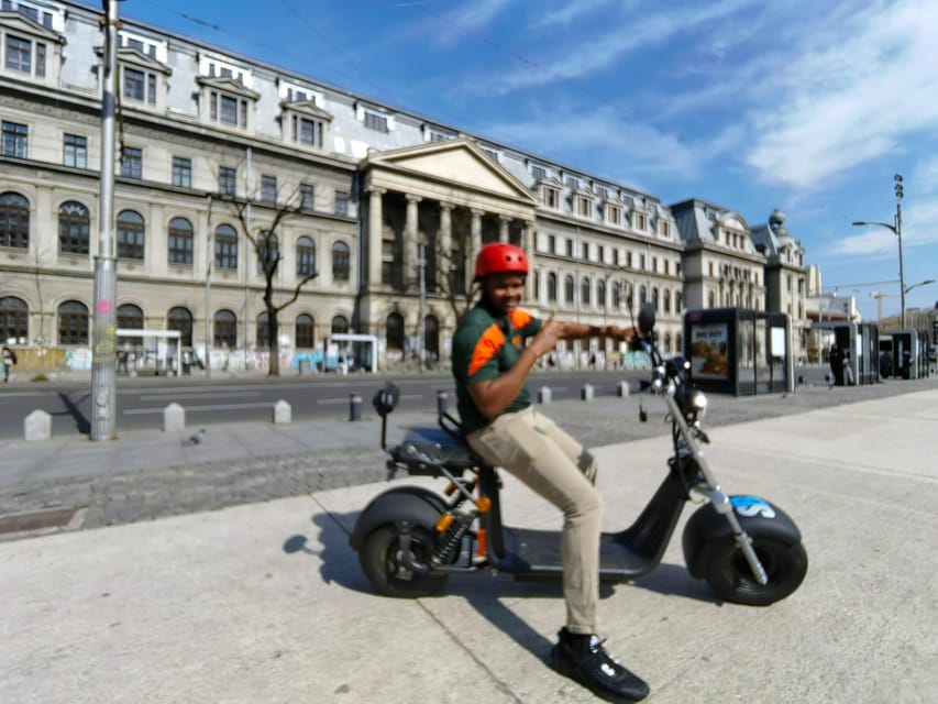 Bucharest electric city tour by Smart Balance #green - House of the Free Press and the Triumphal Arch payoff