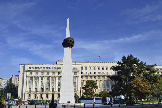 Bucharest one day tour with Parliament Palace and Village Museum - Revolution Square and the monuments that set the emotional tone