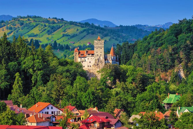 Bran Castle above its village in the Carpathian foothills