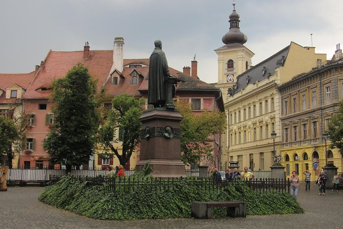 Day Trip to Sibiu and Fagaras Fortress from Bucharest - Fagaras Fortress: moat-surrounded power, Michael the Brave, and the Iron Lady