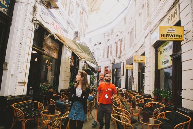 Discover Bucharest: Private Highlights and Traditional Food Tour - Revolution Square and the Parliament shock: power, propaganda, and what it cost