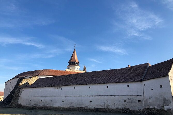Experience the History of Bran Castle and Saxon Fortifications in Burzenland - Harman’s fortified church: Roman basilica with Gothic touches and a water moat