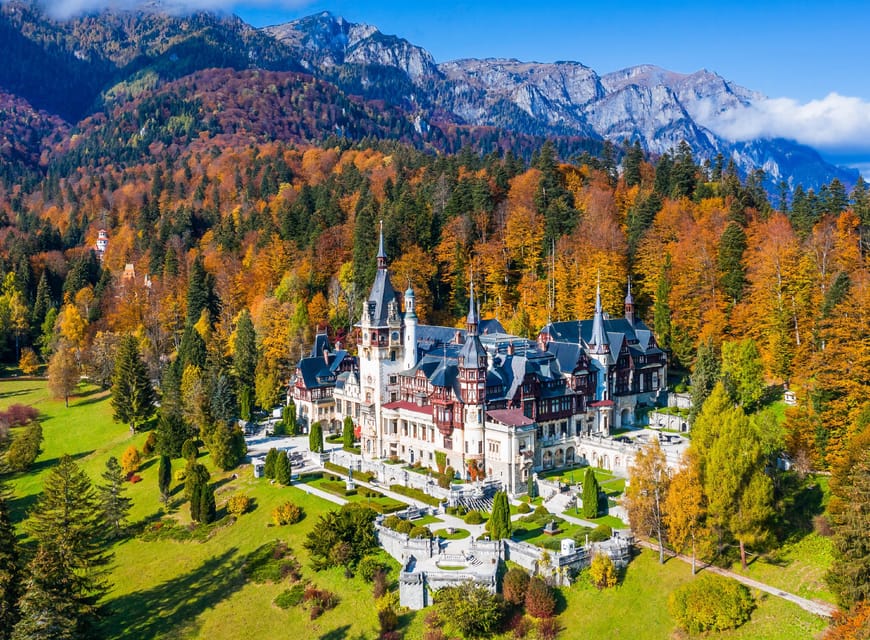 From Bucharest: Day Trip to Peles, Dracula's Castle, Brasov - Bran Castle and the Dracula vibe: cliff views and guided corridors