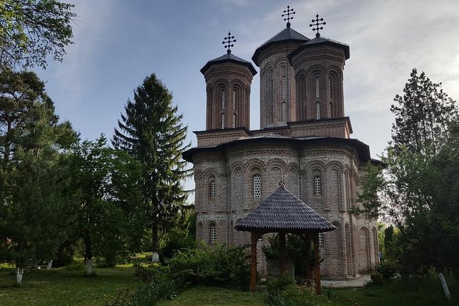 Half-Day Private Sightseeing Tour of Bucharest and its Surroundings Package - Snagov Monastery and the Vlad the Impaler legend in a lake setting