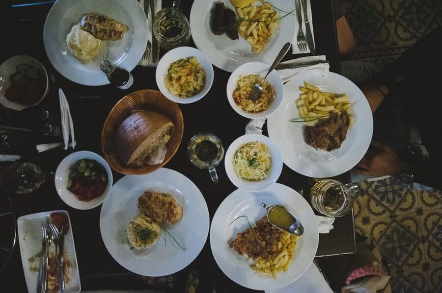 Private Bucharest: History & Food with Traditional Meal - Revolution Square, covrig in hand: why this start matters
