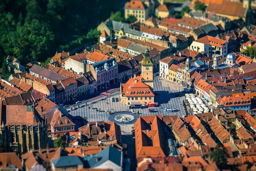 Transylvania's Trail: Sibiu, Bran Castle, Brasov, Sighisoara - Brasov Evening: Black Church and Council Square After the Ride