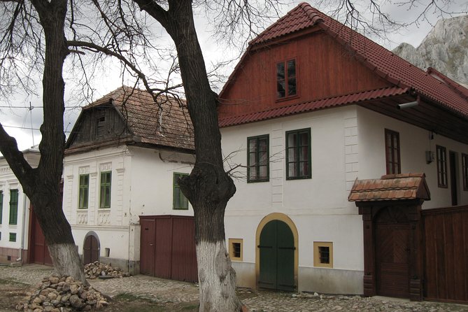 Turda salt mine, Rimetea village and Alba Iulia, from Cluj - Rimetea in the Apuseni Mountains: White Houses, Iron Mines, and Gate Symbols